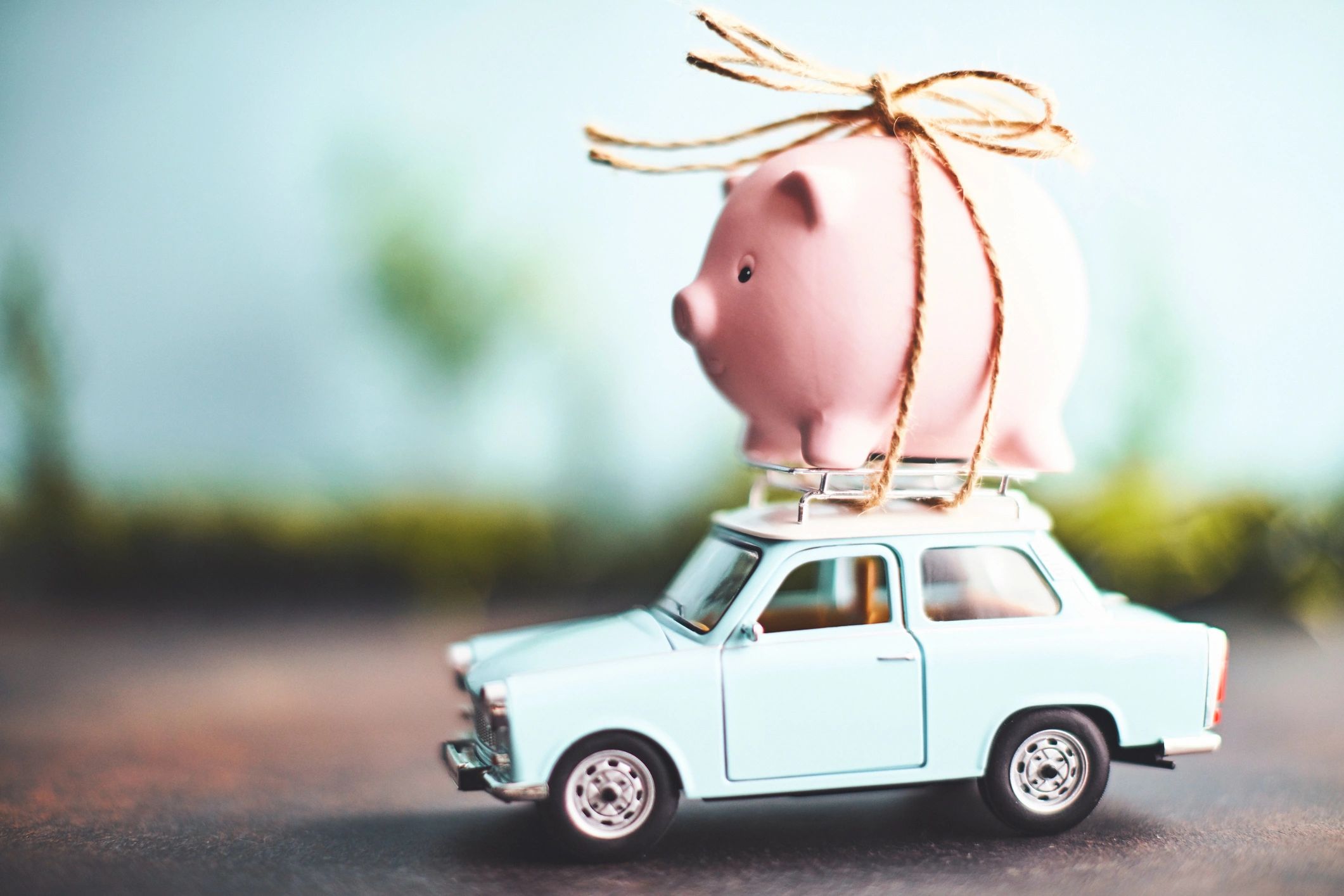 Car-related paperwork and savings concept