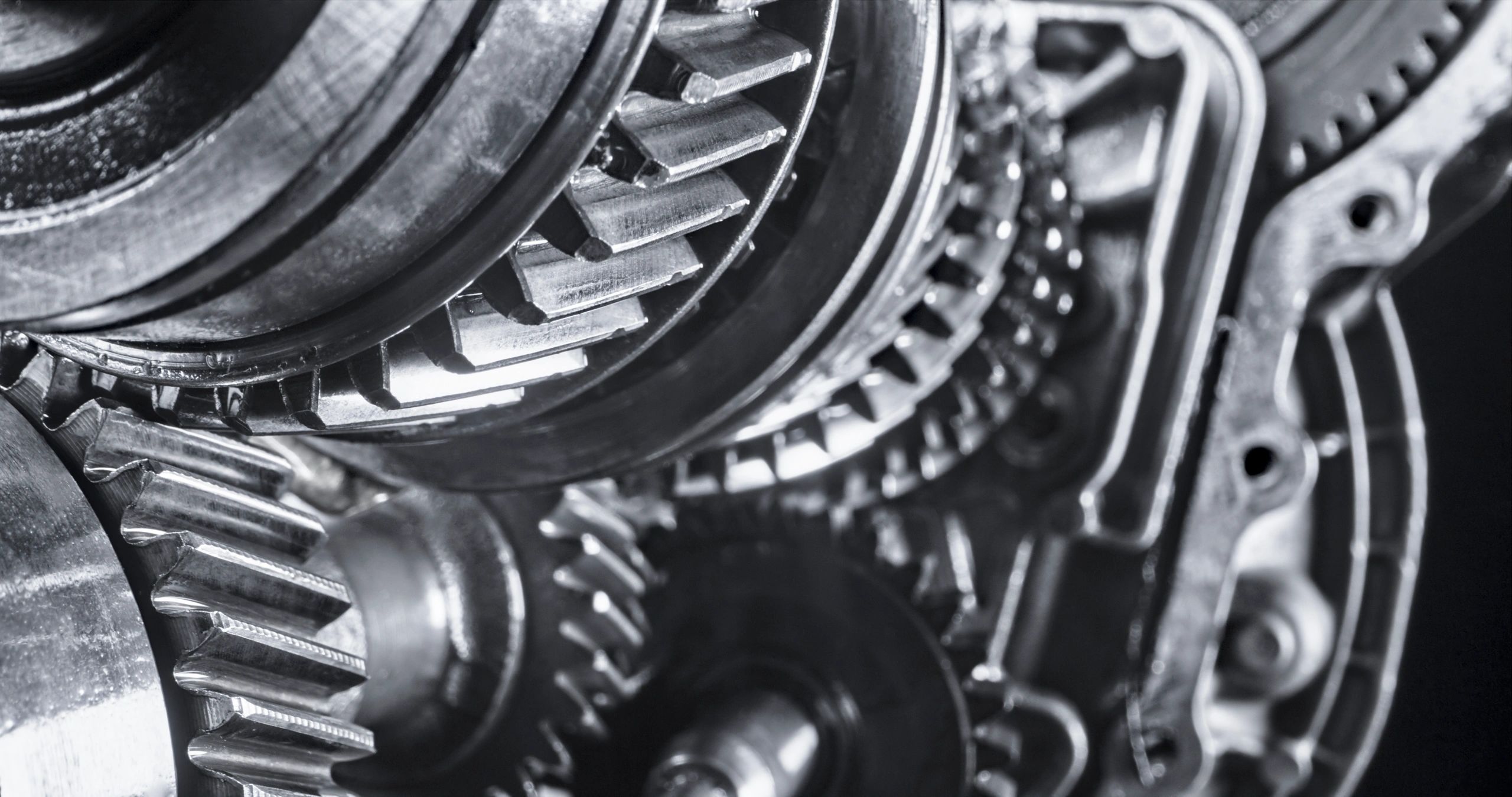 Close-up of metal gears inside a gearbox